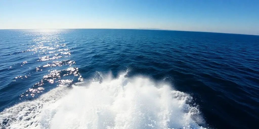 Starboard side of a boat on open water.