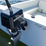 A budget-friendly trolling motor on a small boat.