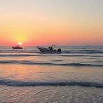 Capsized boat at sunset near Wrightsville Beach.