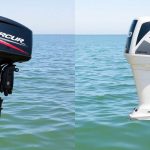 Two distinct electric outboard motors side by side.