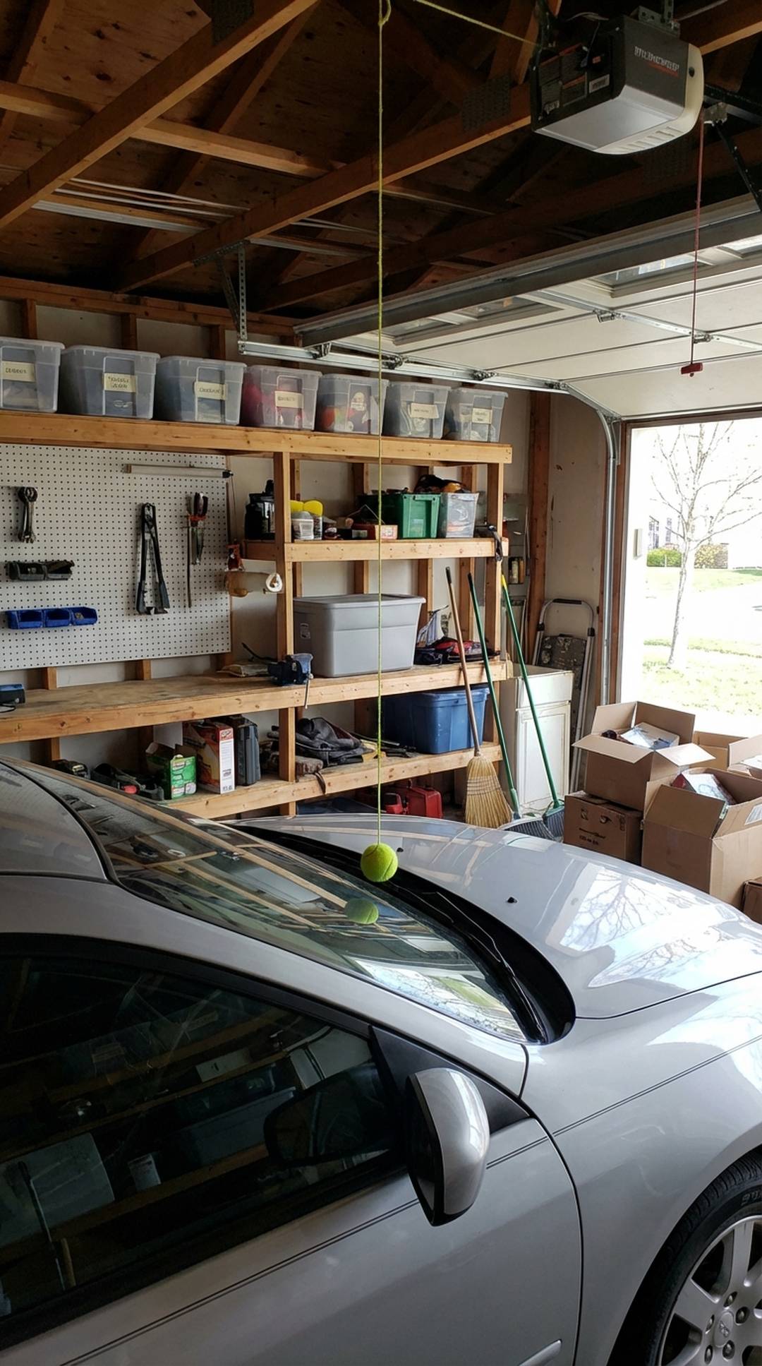 Tennis ball hanging from ceiling as parking guide
